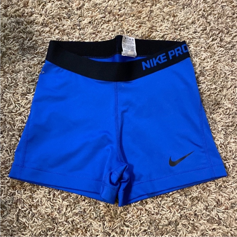 Blue Nike pros